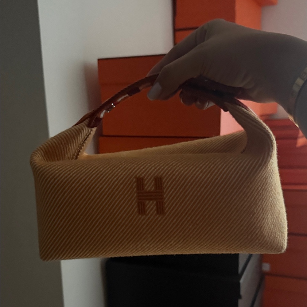 Hermes Tan Cosmetic Bag with Red Handle